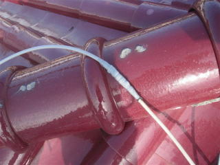 雪の重みで屋根のアンテナケーブルが引っ張られ断線_施工後